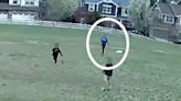 Terrifying moment boy is almost snatched by kidnapper in broad daylight