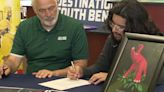 Adams HS senior, graphic designer signs contract with Indiana Dinosaur Museum