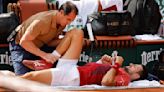 Novak Djokovic wins his record 370th Slam match but isn't sure he can continue at the French Open