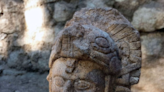 Archaeologists find strange Maya warrior statue with helmet shaped like snake