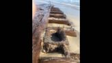 Shipwreck found buried on Outer Banks beach ignites debate over its mysterious past