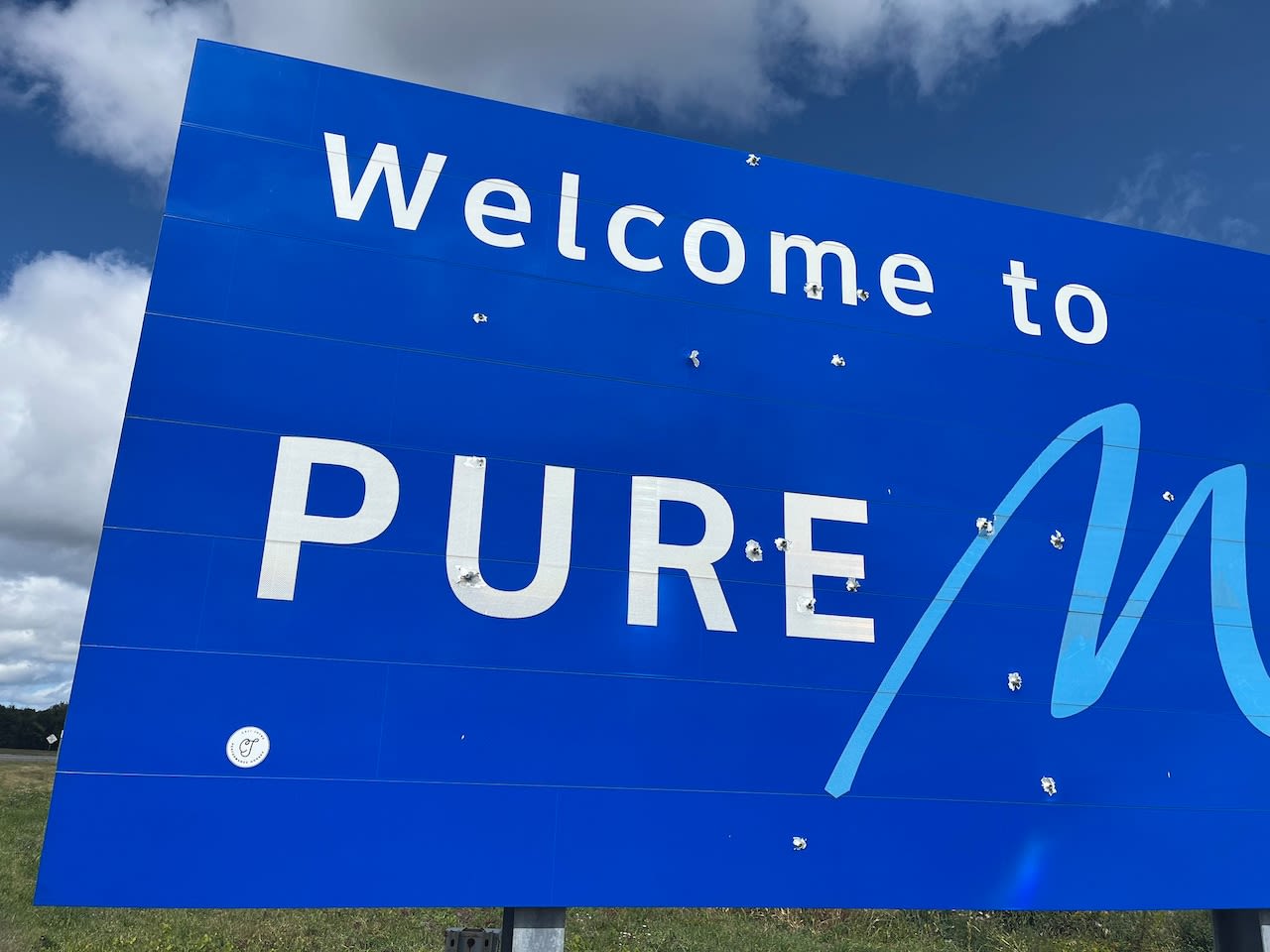 ‘Welcome to Pure Michigan’ sign on U.S. 31 hit 18 times by gunfire