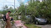 A powerful summer storm sweeps through Balkans with hail, rain and winds, killing 2