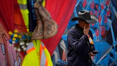 Loved ones await recovery of 2 bodies from Baltimore bridge wreckage a month after the collapse