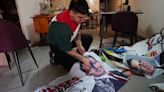 Mexican fashion designer recycles election ads into tote bags
