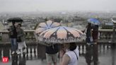 Pouring rain disrupts Olympic Games after drenched opening ceremony - The Economic Times