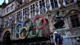 As the Olympics loom, Parisians ask: Should we skip town? Games organizers work to win their hearts