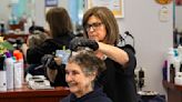 'Delightful hairdresser' puts away scissors after 54 years