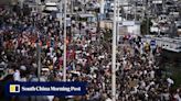 Thousands march in France in pre-election protest against far-right