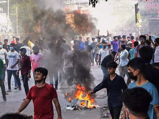 32 dead in Bangladesh unrest, protesters set fire to state TV network - The Economic Times