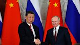 Russia’s Putin arrives in China for state visit with Xi in a show of unity