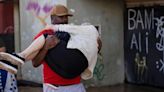 Brazil floods drive thousands from their homes