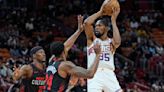 Gordon scores 23, Booker scores 22 and Suns add to Miami's woes with 118-105 win