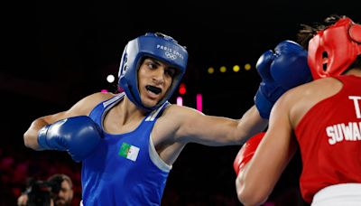 Boxing-Algerian Khelif wins semi-final amid gender dispute