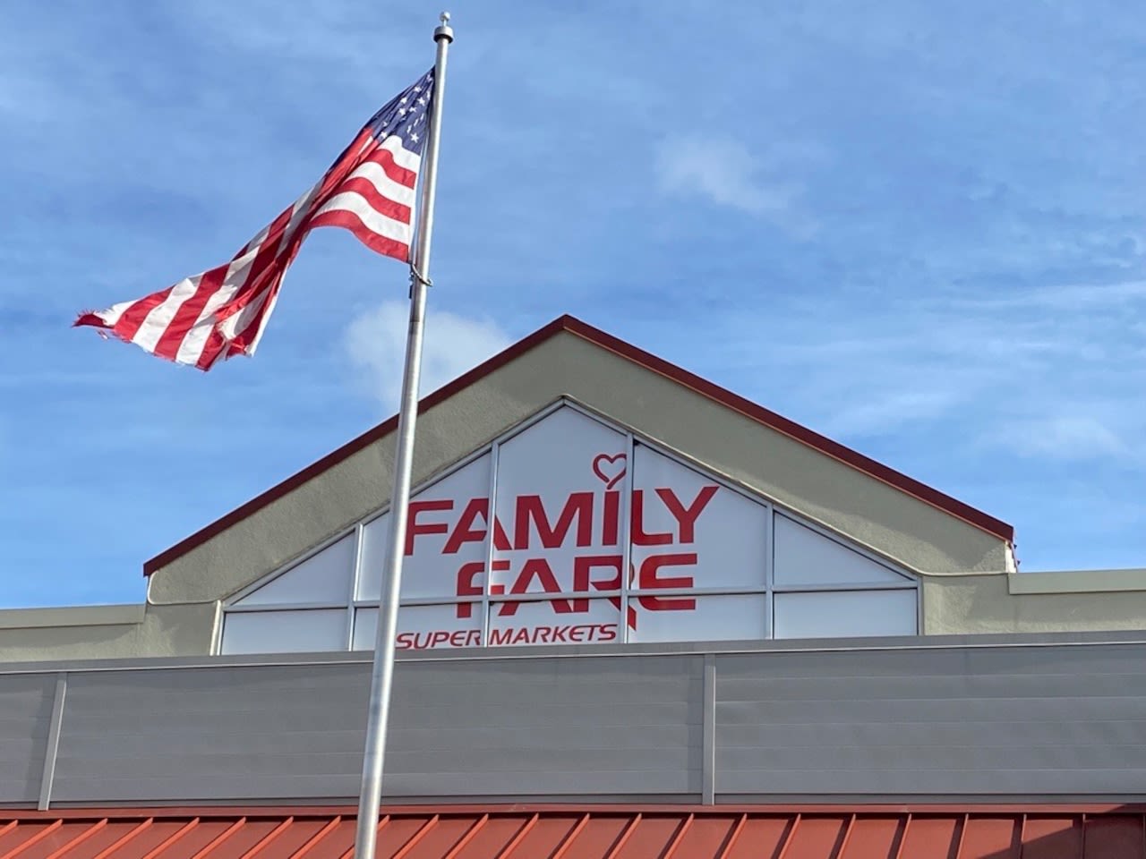 Woman found living inside Michigan grocery store sign