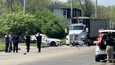 Coroner IDs 2 men killed in crash involving car, semi near Dayton bank