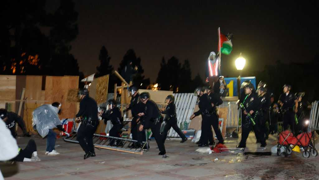 Hundreds of pro-Palestinian protesters remain on UCLA campus despite police ordering them to leave