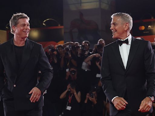 Brad Pitt and George Clooney Dance to 4-Minute Standing Ovation for ‘Wolfs’ During Chaotic Venice Premiere