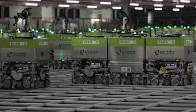 Ocado shares rally as British online grocer narrows losses