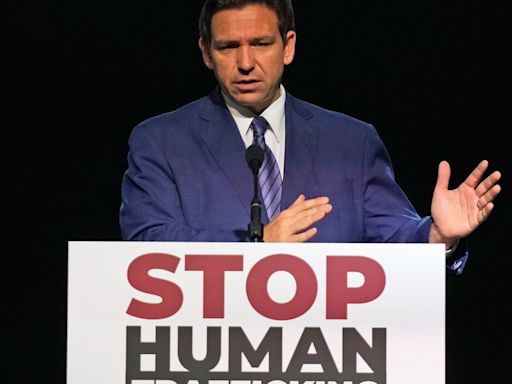 Gov. DeSantis signs law to combat human trafficking, raises stripper age to 21