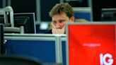 FTSE 100 closes higher, Sainsbury shines