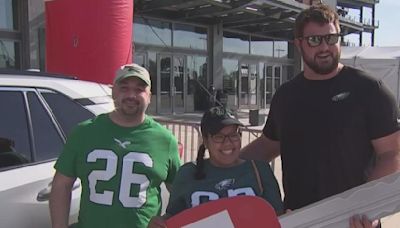 Landon Dickerson helps Philadelphia Eagles fan receive brand-new RAV4 as part of Toyota's Fan Giveaway