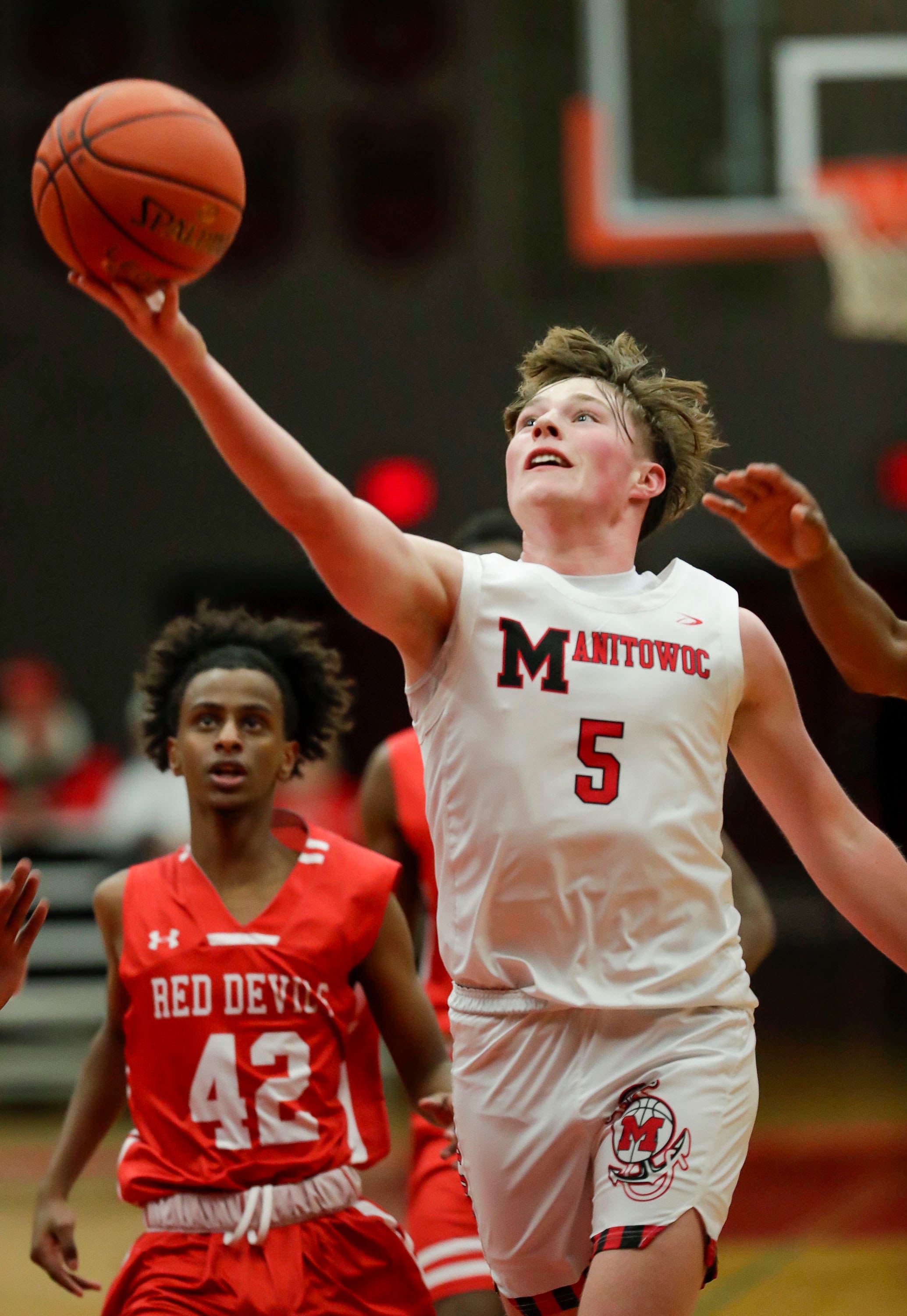 New Manitowoc Lincoln boys basketball coach Shane Evans glad for life's 'different path'