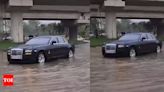 Watch: Flooded roads halt Rolls-Royce Ghost in Delhi as hatchbacks move past, video viral - Times of India