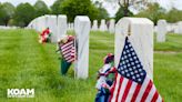 Volunteers honor Veterans with flags at Peace Church for Memorial Day