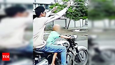 Youth allows kid to ride his bike, held | Surat News - Times of India