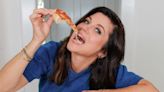 Tiffani Thiessen enjoys a cheat day with pizza after posing nude