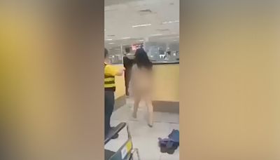 Naked woman in Philippines airport walks through security in fit over visa issue