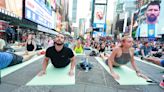 Yogis celebrate summer solstice in Times Square