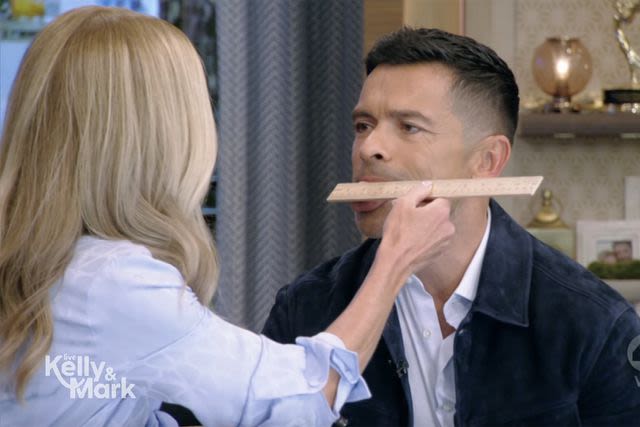 Kelly Ripa measures Mark Consuelos' tongue on “Live”