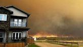 Canadian oil sands city evacuated as wildfire draws near