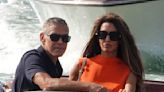 Amal Clooney looks glamorous as she leaves Venice with husband George