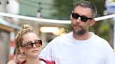 Jennifer Lawrence Masters Chic Comfort With Baggy Low-Rise Mom Jeans and Tan Strappy Slides While Out With Husband in NYC