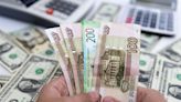 Russian rouble firms past 62 vs dollar, Yandex shares fall after EU sanctions