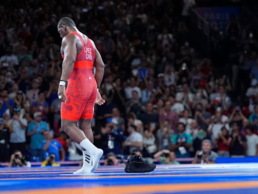 A Cuban wrestler won his fifth straight Olympic gold and then immediately retired