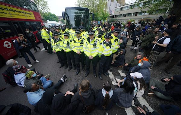 Protesters block coach in Peckham from taking asylum seekers to Bibby Stockholm barge