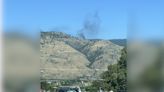 Human caused fire sends black smoke into sky west of Osoyoos