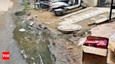 Sewage overflowing, ‘contaminating drinking water’ in Gurgaon's Sushant Lok 1 | Gurgaon News - Times of India
