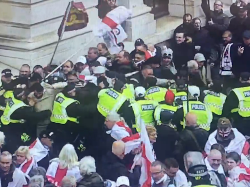 St George's Day central London rally turns violent as brawl with police erupts and four arrests