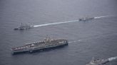 US allies, united against China, reignite territorial feud