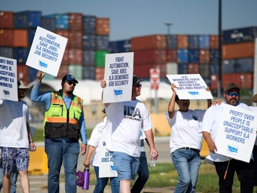 Striking port workers to return to work Friday as negotiators reach an agreement on wages | CNN Business