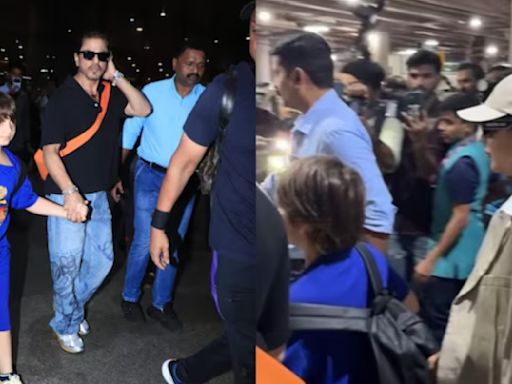 Shah Rukh Khan holds son AbRam’s hand, escorts Gauri Khan to the car as family return to Mumbai. Watch