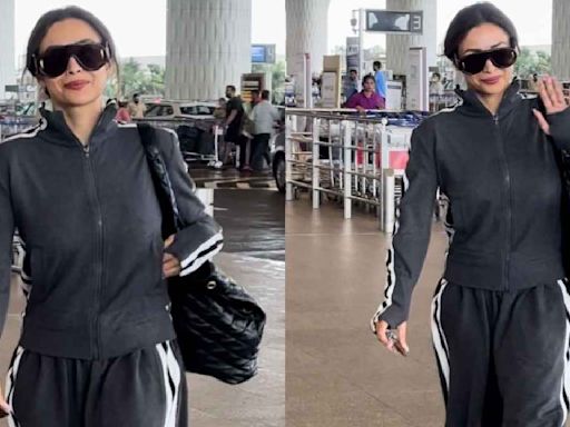 Malaika Arora’s comfortably chic airport look gets a luxe touch with high-end YSL bag