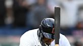 Batman: Guardians slugger Josh Naylor celebrates his homer by striking himself on the helmet