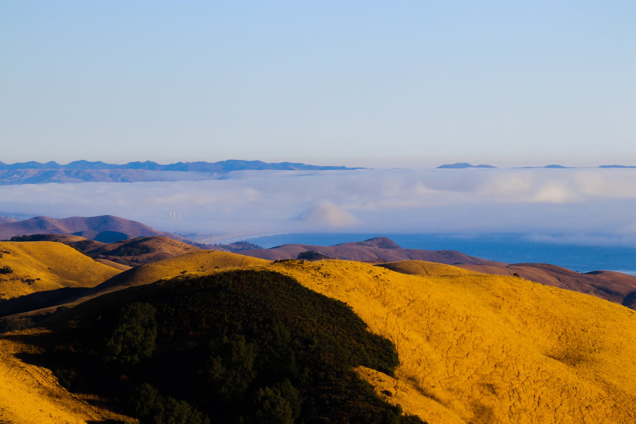 The marine layer is keeping coasts cool while interiors face triple digits