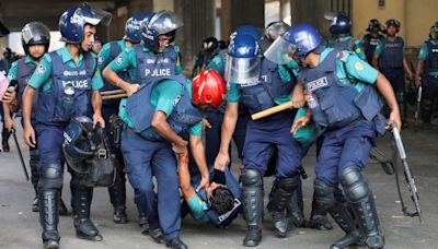 Nearly 100 killed in deadliest day of Bangladesh violence yet as protesters call for Hasina to go